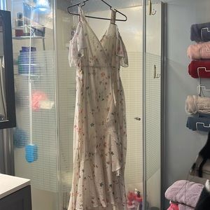 Long beautiful dress, never worn, new with tags. Size 10p